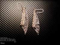 Ancient silver earrings filigree