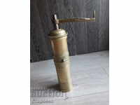 Old bronze coffee grinder