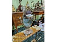 A wonderful antique bronze English mirror