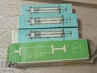 Vintage glass syringes