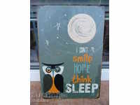 Metal signboard inscription message Can not smile owl