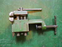 a small (watchmaker's) vise